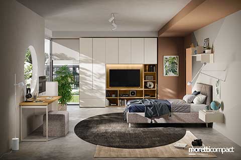 Camera con armadio battente e libreria Camera con armadio battente e libreria